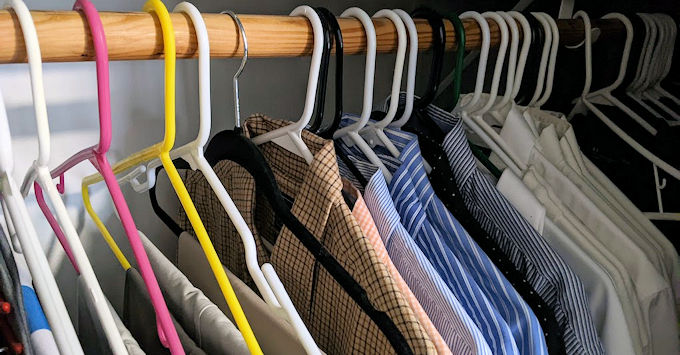 Closet with shirts and slacks
